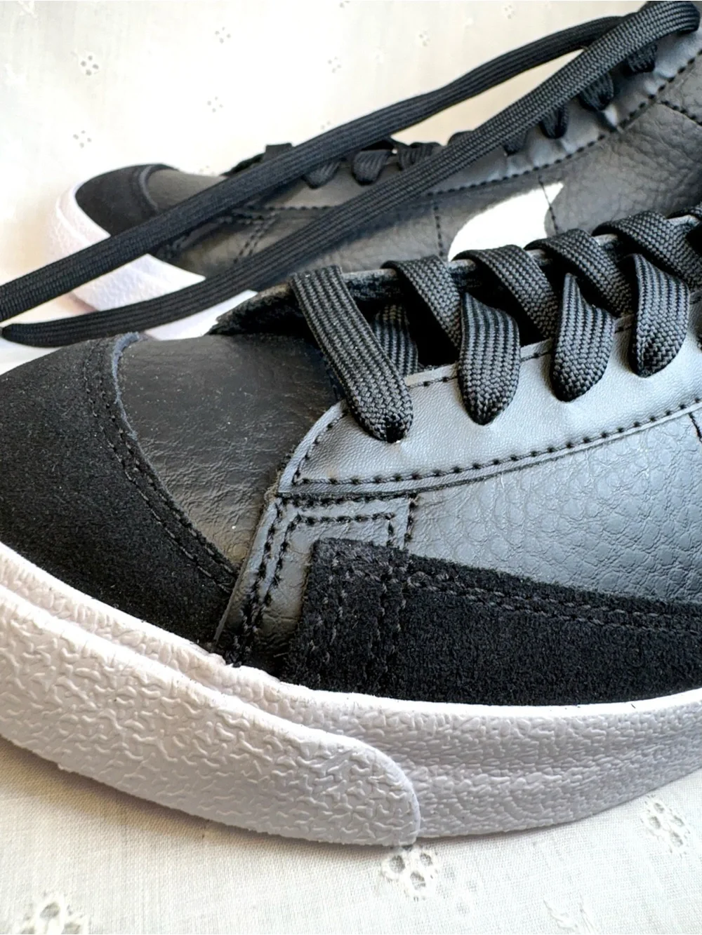 Nike Black High-Top Sneakers with White Tongue Text